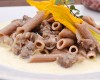 Penne di farro Monterosso alla salsiccia su crema di formaggio Brie