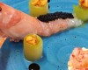 Battuto di gambero rosso con robiola delle Langhe, scampo crudo al caviale e crudité di verdure con caramello alle arachidi