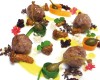 Praline di salamella trevigiana laccate al miele di pino mugo con finferli del Cadore, fave di cacao, salsa alla patata di Rotzo e sferificazione con vino rosso e Prosecco
