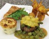 Filetto di Angus gratinato in manto di erbette con salsa di asparagi,tortino di ricotta e asparagi verdi, cornetto farcito con robiola e rucola, fritto di zucchine e zenzero all’indiana