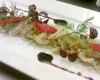 Crudo di seppie nostrane al sesamo tostato, germogli e pomodoro confit