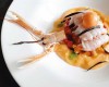 Scampi crudi con salsa di papaia